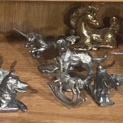 Sale Photo Thumbnail #40: D metal figurines dogs unicorns hats