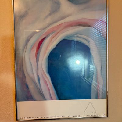 Framed exhibition poster for Georgia O'Keeffe's "Music - Pink and Blue No. 1" from the Los Angeles County Museum of...