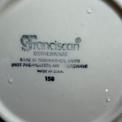 Underside maker's mark on a piece of vintage Franciscan Dinnerware, showing the Made in U.S.A. stamp and care instructions.
