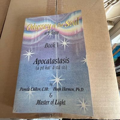 Paperback copy of "Odyssey of the Soul, Book I: Apocatastasis" by Pamela Chilton, Hugh Harmon, and Master of Light.