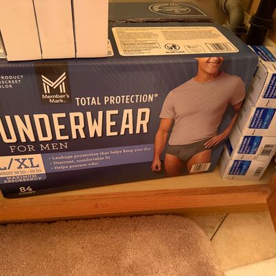 Sale Photo Thumbnail #110: Large box of Member's Mark Total Protection underwear for men in size L/XL, stacked alongside boxes of Albuterol Sulfate inhalation solution under a cabinet.