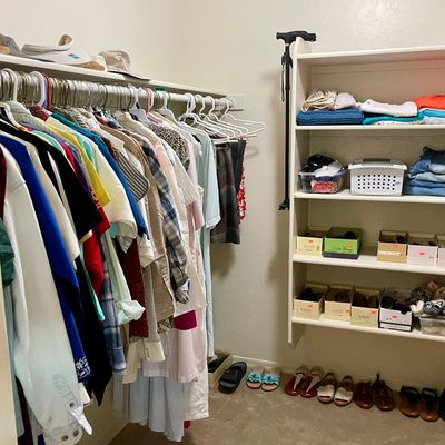 Sale Photo Thumbnail #13: Walk-in closet filled with women's clothing and shoes