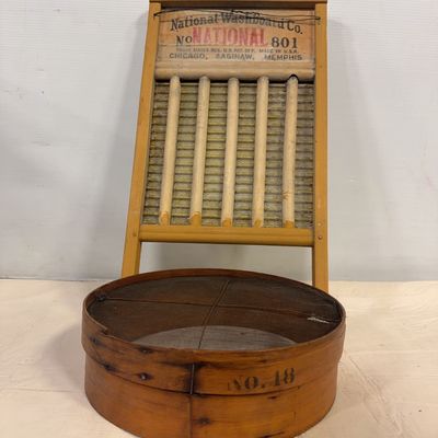 Vintage National Washboard Co. No. 801 wooden washboard with a corrugated glass insert, paired with a round bentwood mesh sifter marked...