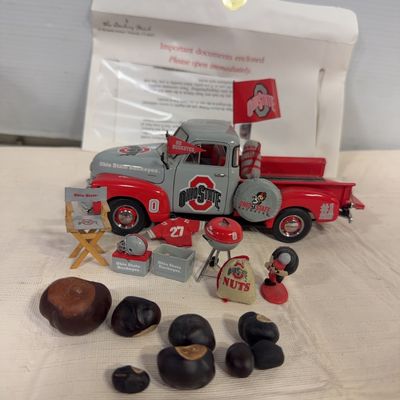 Ohio State Buckeyes Danbury Mint die-cast pickup truck set featuring miniature tailgate accessories and real buckeye nuts.