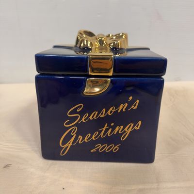 Cobalt blue ceramic gift box dish with gold metallic bow detail, inscribed with "Season's Greetings 2006".