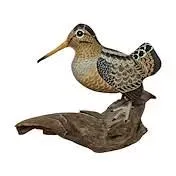 Sale Photo Thumbnail #19: Hand-carved and painted wooden shorebird decoy mounted on a natural driftwood base.