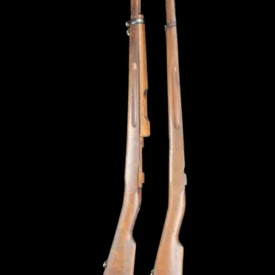 Sale Photo Thumbnail #53: Vintage wooden rifle stock components and parts set, including two full stocks, handguard, cleaning rod, and metal hardware.