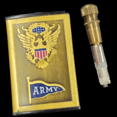 Sale Photo Thumbnail #109: Vintage US Army permanent match lighter with a brass case and unscrewable striker stick.