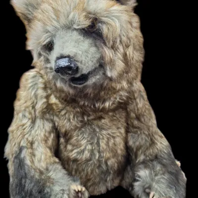 Sale Photo Thumbnail #118: Realistic vintage plush grizzly bear figure featuring textured fur and detailed claws.