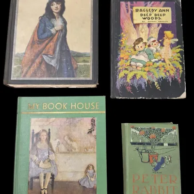 Sale Photo Thumbnail #111: Collection of four vintage children's and classic hardbound books, including Lorna Doone, Raggedy Ann in the Deep Deep Woods, My Book House, and Peter Rabbit.