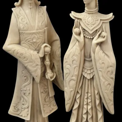 Sale Photo Thumbnail #162: Pair of vintage Asian resin emperor and empress figurines featuring intricate relief carving and bead-detailed headpieces.