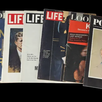 Sale Photo Thumbnail #59: Collection of seven vintage 1960s magazines featuring John F. Kennedy commemorative covers, including Life, Look, and The Saturday Evening Post.