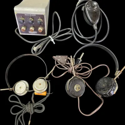 Sale Photo Thumbnail #91: Vintage audio communications equipment set including a Speco Max-Mixer, hand microphone, and two pairs of antique headphones.