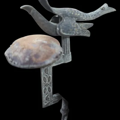 Sale Photo Thumbnail #43: Antique Victorian brass bird sewing clamp with an integrated pin cushion and detailed floral engravings.