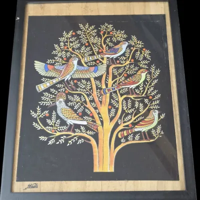 Sale Photo Thumbnail #70: Framed Egyptian papyrus painting depicting colorful birds perched in a tree of life against a black background.
