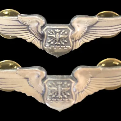 Sale Photo Thumbnail #130: Pair of vintage U.S. military or airline pilot wings lapel pins with clutch backs.
