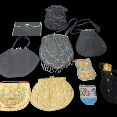 Sale Photo Thumbnail #122: Collection of vintage ladies' evening purses and pouches, including beaded, embroidered tapestry, metallic brocade, and velvet styles.