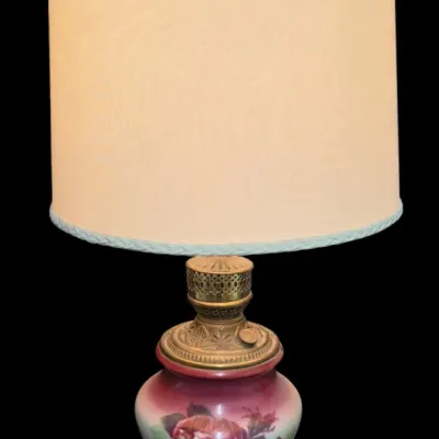Sale Photo Thumbnail #61: Vintage Gone with the Wind style electric table lamp featuring a hand-painted floral glass body on an ornate metal base with a light cream drum shade.