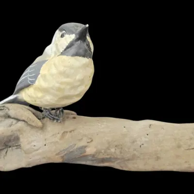Sale Photo Thumbnail #33: Hand-carved and painted wooden chickadee figurine mounted on a piece of natural driftwood.