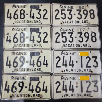 Sale Photo Thumbnail #82: Collection of four matching pairs of vintage Maine "Vacationland" license plates, featuring expiration stickers from 1962, 1966, and 1967.