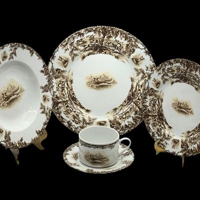Sale Photo Thumbnail #198: Aiken Hunt dinnerware collection is a timeless pattern inspired by the fox hunting scene of Aiken, South Carolina. Made of porcelain, each piece is hand-decorated and depicts either the Fox or the Hound is an attractive soft brown. Image of running fox an