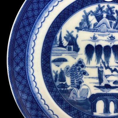 Sale Photo Thumbnail #215: A porcelain dinnerware set serving for 6 in the Blue Canton pattern by Mottahedeh. The elegantly simple design and enduring quality of Canton ware made as an iconic example of serve-ware that has withstood the test of time. For those looking to expand the