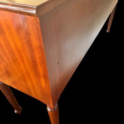 Sale Photo Thumbnail #96: Elegant and high quality Kindel Furniture sideboard executed in the Federal Style with refined neoclassical elements. It features a bow front design, characteristic of the period with flame mahogany veneers, and contrasting stringing inlay. The piece is s