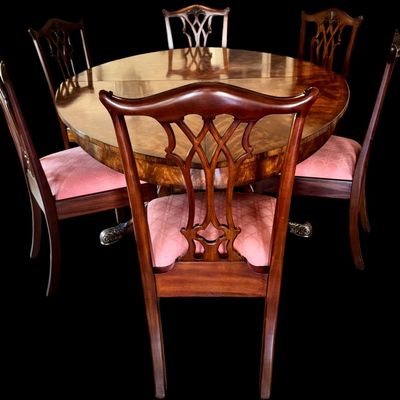 Sale Photo Thumbnail #56: Set of 8 Maitland Smith mahogany Chippendale style dining chairs. High quality craftsmanship with fine carved detail. Knuckle arms with pierced shell covered backs. 
Condition:: Excellent, like new, original finish
Dimensions: 26”W x 22.5”D x 40”H
A