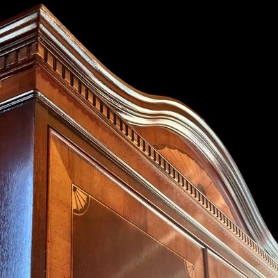 Sale Photo Thumbnail #124: Elegant banded entertainment armoire manufactured in the finest craftsmanship. The beautiful piece is crafted in richly figured wood with a warm finish featuring decorative wood banding along the top, 4 upper drawers and 4 spacious drawers, decorative bra