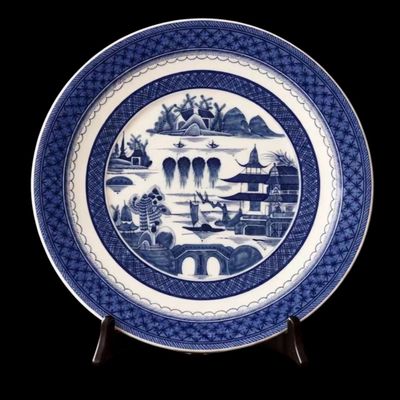 Sale Photo Thumbnail #211: A porcelain dinnerware set serving for 6 in the Blue Canton pattern by Mottahedeh. The elegantly simple design and enduring quality of Canton ware made as an iconic example of serve-ware that has withstood the test of time. For those looking to expand the