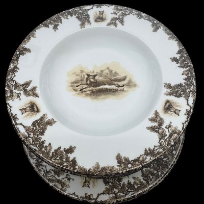 Sale Photo Thumbnail #204: Aiken Hunt dinnerware collection is a timeless pattern inspired by the fox hunting scene of Aiken, South Carolina. Made of porcelain, each piece is hand-decorated and depicts either the Fox or the Hound is an attractive soft brown. Image of running fox an