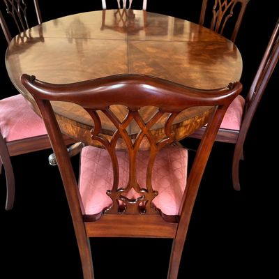 Sale Photo Thumbnail #57: Set of 8 Maitland Smith mahogany Chippendale style dining chairs. High quality craftsmanship with fine carved detail. Knuckle arms with pierced shell covered backs. 
Condition:: Excellent, like new, original finish
Dimensions: 26”W x 22.5”D x 40”H
A