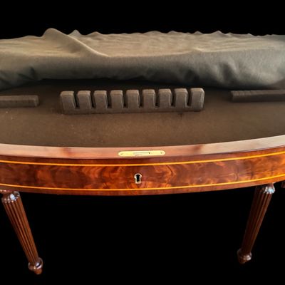 Sale Photo Thumbnail #87: Elegant and high quality Kindel Furniture sideboard executed in the Federal Style with refined neoclassical elements. It features a bow front design, characteristic of the period with flame mahogany veneers, and contrasting stringing inlay. The piece is s