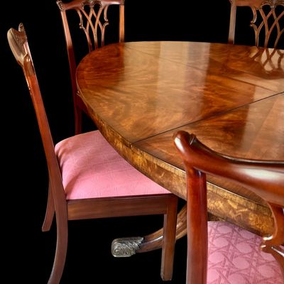 Sale Photo Thumbnail #62: Set of 8 Maitland Smith mahogany Chippendale style dining chairs. High quality craftsmanship with fine carved detail. Knuckle arms with pierced shell covered backs. 
Condition:: Excellent, like new, original finish
Dimensions: 26”W x 22.5”D x 40”H
A