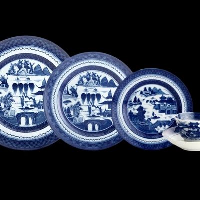 Sale Photo Thumbnail #210: A porcelain dinnerware set serving for 6 in the Blue Canton pattern by Mottahedeh. The elegantly simple design and enduring quality of Canton ware made as an iconic example of serve-ware that has withstood the test of time. For those looking to expand the