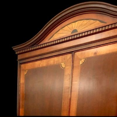 Sale Photo Thumbnail #118: Elegant banded entertainment armoire manufactured in the finest craftsmanship. The beautiful piece is crafted in richly figured wood with a warm finish featuring decorative wood banding along the top, 4 upper drawers and 4 spacious drawers, decorative bra