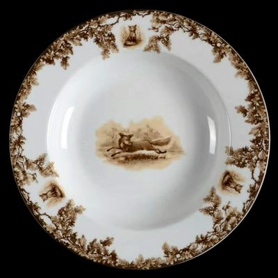 Sale Photo Thumbnail #202: Aiken Hunt dinnerware collection is a timeless pattern inspired by the fox hunting scene of Aiken, South Carolina. Made of porcelain, each piece is hand-decorated and depicts either the Fox or the Hound is an attractive soft brown. Image of running fox an