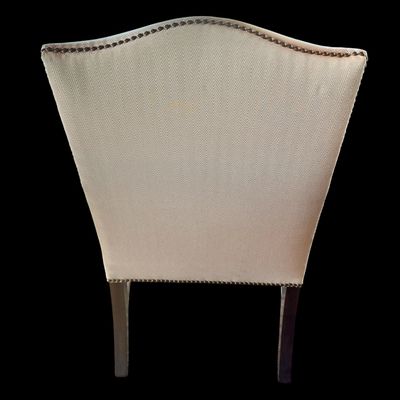 Sale Photo Thumbnail #148: Handsome pair of Chippendale style arm chairs featuring a high, slightly arched back and fluted, dark stained wooden arms and legs. The chairs are upholstered in a neutral chevron pattern fabric, accented with decorative brass tone nailhead trim along the