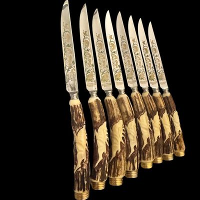 Sale Photo Thumbnail #220: Cutlery makers in the town of Solingen, Germany, produced specialized hunting flatware with natural horn handles for export and domestic markets. These sets were crafted during the mid-20th century to satisfy a strong demand for rustic, outdoor-themed din