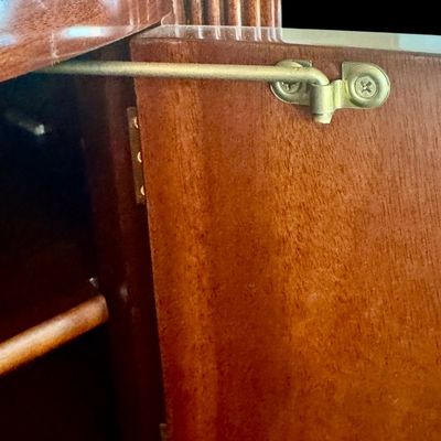 Sale Photo Thumbnail #93: Elegant and high quality Kindel Furniture sideboard executed in the Federal Style with refined neoclassical elements. It features a bow front design, characteristic of the period with flame mahogany veneers, and contrasting stringing inlay. The piece is s