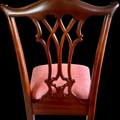 Sale Photo Thumbnail #52: Set of 8 Maitland Smith mahogany Chippendale style dining chairs. High quality craftsmanship with fine carved detail. Knuckle arms with pierced shell covered backs. 
Condition:: Excellent, like new, original finish
Dimensions: 26”W x 22.5”D x 40”H
A