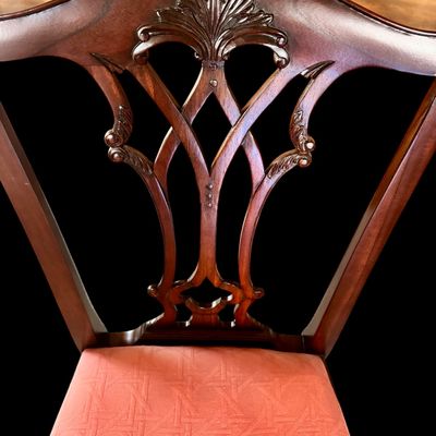 Sale Photo Thumbnail #47: Set of 8 Maitland Smith mahogany Chippendale style dining chairs. High quality craftsmanship with fine carved detail. Knuckle arms with pierced shell covered backs. 
Condition:: Excellent, like new, original finish
Dimensions: 26”W x 22.5”D x 40”H
A