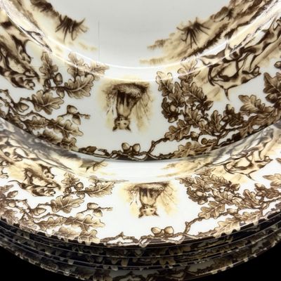 Sale Photo Thumbnail #206: Aiken Hunt dinnerware collection is a timeless pattern inspired by the fox hunting scene of Aiken, South Carolina. Made of porcelain, each piece is hand-decorated and depicts either the Fox or the Hound is an attractive soft brown. Image of running fox an