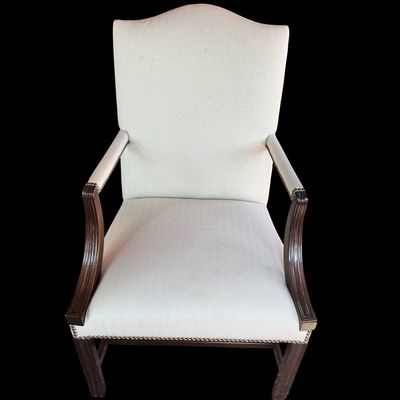 Sale Photo Thumbnail #147: Handsome pair of Chippendale style arm chairs featuring a high, slightly arched back and fluted, dark stained wooden arms and legs. The chairs are upholstered in a neutral chevron pattern fabric, accented with decorative brass tone nailhead trim along the
