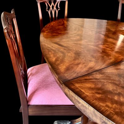 Sale Photo Thumbnail #60: Set of 8 Maitland Smith mahogany Chippendale style dining chairs. High quality craftsmanship with fine carved detail. Knuckle arms with pierced shell covered backs. 
Condition:: Excellent, like new, original finish
Dimensions: 26”W x 22.5”D x 40”H
A