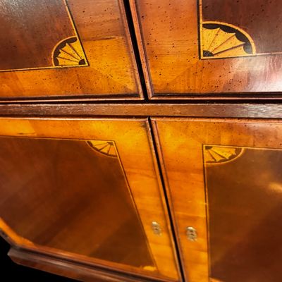 Sale Photo Thumbnail #121: Elegant banded entertainment armoire manufactured in the finest craftsmanship. The beautiful piece is crafted in richly figured wood with a warm finish featuring decorative wood banding along the top, 4 upper drawers and 4 spacious drawers, decorative bra