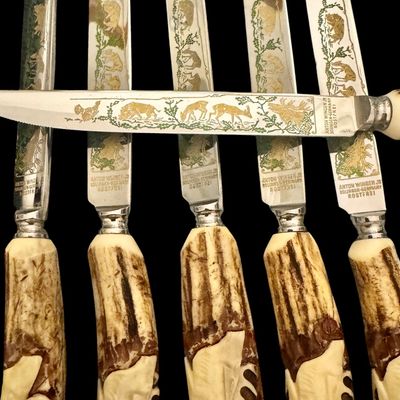 Sale Photo Thumbnail #223: Cutlery makers in the town of Solingen, Germany, produced specialized hunting flatware with natural horn handles for export and domestic markets. These sets were crafted during the mid-20th century to satisfy a strong demand for rustic, outdoor-themed din