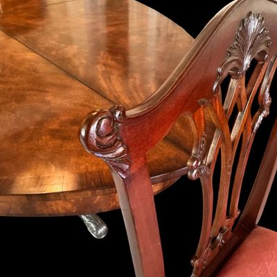 Sale Photo Thumbnail #58: Set of 8 Maitland Smith mahogany Chippendale style dining chairs. High quality craftsmanship with fine carved detail. Knuckle arms with pierced shell covered backs. 
Condition:: Excellent, like new, original finish
Dimensions: 26”W x 22.5”D x 40”H
A