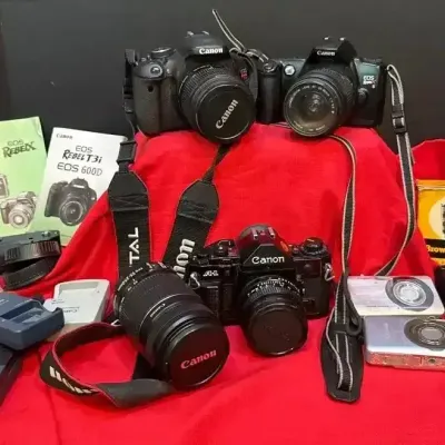 Sale Photo Thumbnail #8: 5 Canon Cameras W/ Accessories 