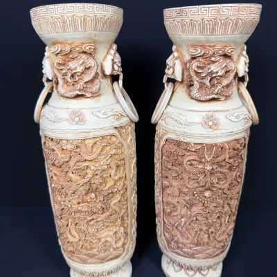 Sale Photo Thumbnail #7: Pair of vintage carved resin vases in an Asian style, featuring intricate dragon motifs and faux ring handles.